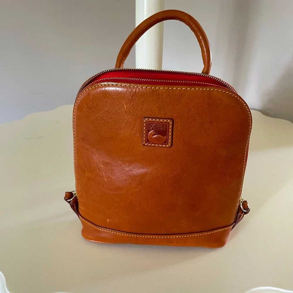 Dooney and Bourke Florentine leather small backpack.